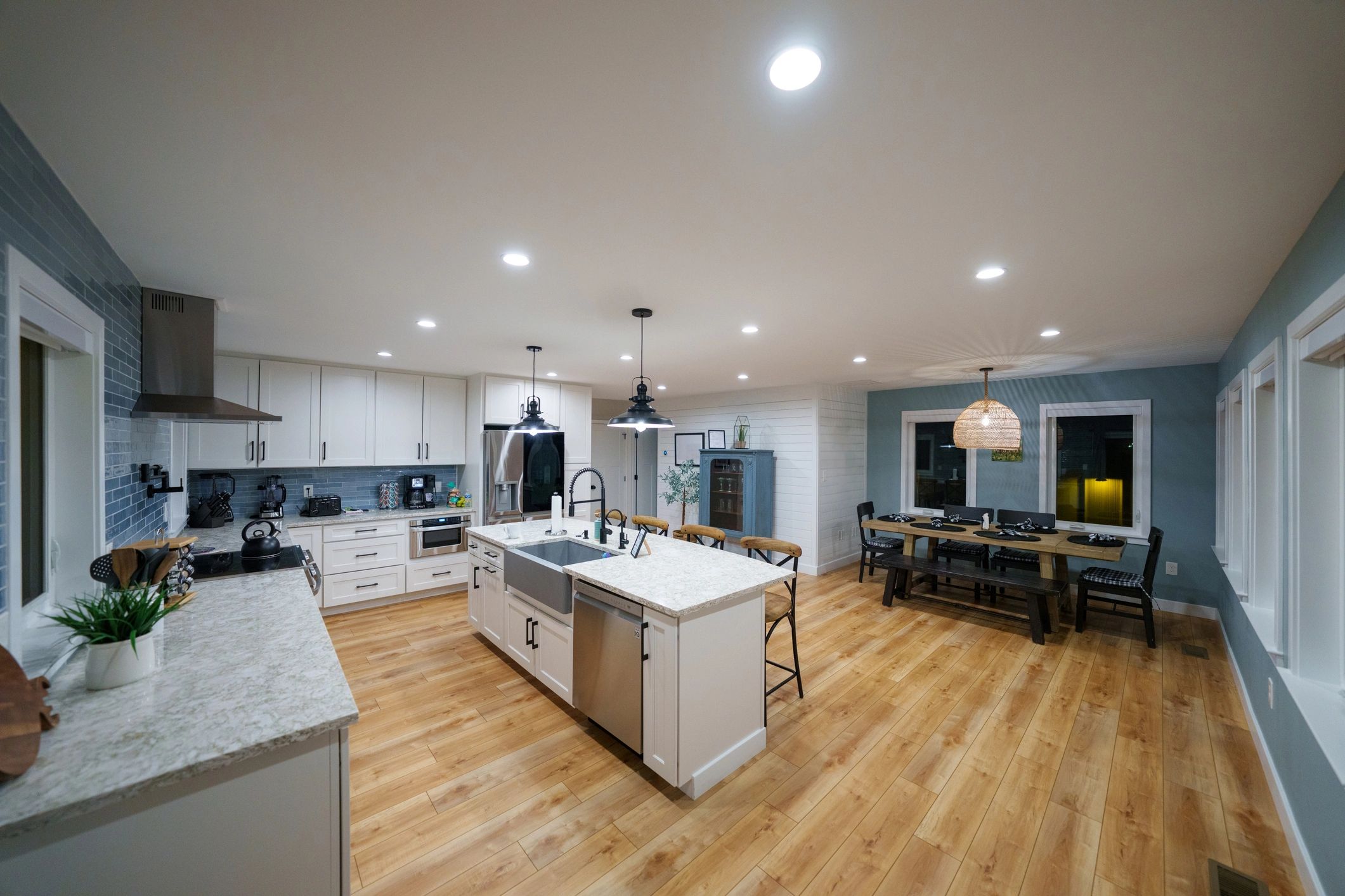 Finished kitchen remodel with island and updated lighting