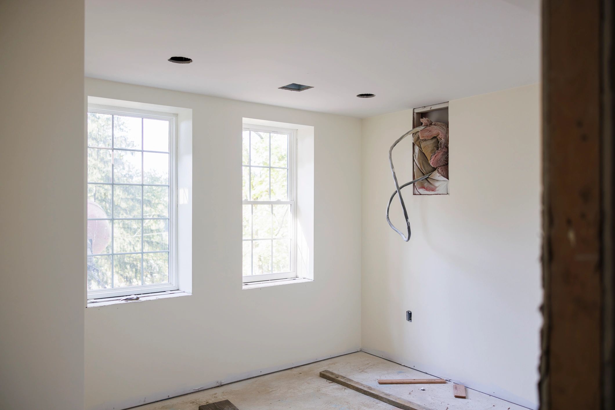 Bright freshly painted room during renovation